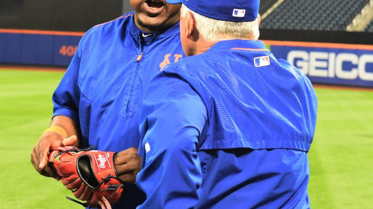 World Series Game 5: Mets vs. Royals 186 New York Mets Juan Uribe (2) talks with New York Mets manager Terry Collins (10) during warmups before Game 5 of the World Series against the Kansas City Royals at Citi Field on Sunday, Nov. 1, 2015.