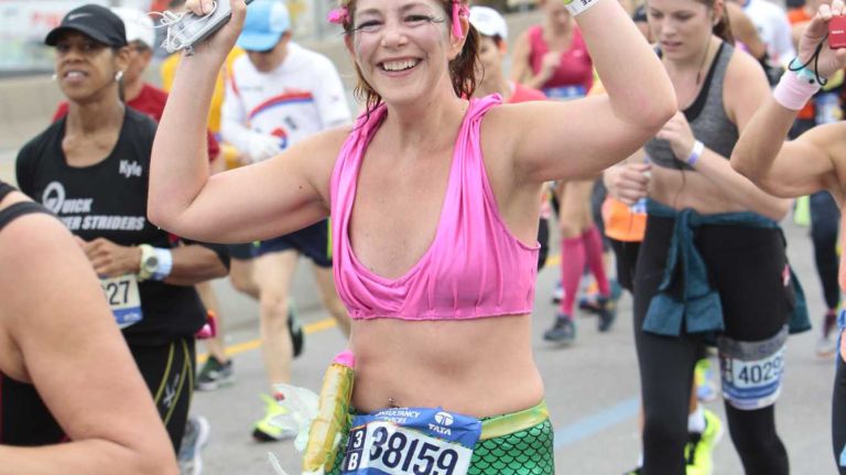 New York City Marathon participants along the race route in Brooklyn on Nov. 1, 2015.