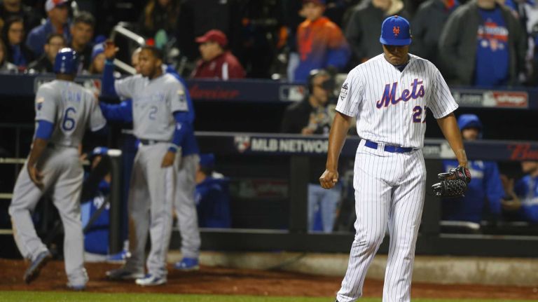 New York Mets relief pitcher Jeurys Familia (27) reacts after the run scores in the eighth inning during Game 4 of the World Series against the Kansas City Royals at Citi Field on Saturday, Oct. 31, 2015.