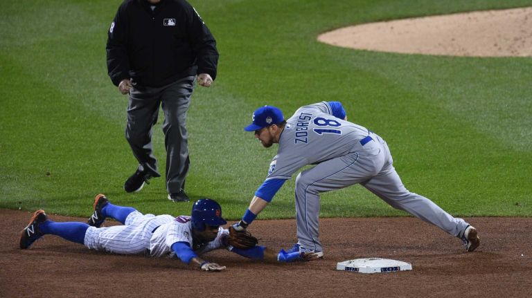 New York Mets right fielder Curtis Granderson is caught attempting to steal second base by Kansas City Royals second baseman Ben Zobrist during Game 4 of the World Series at Citi Field on Saturday, Oct. 31, 2015.