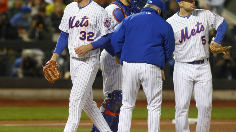 New York Mets manager Terry Collins comes for the ball from Steven Matz in the sixth inning during Game 4 of the World Series against the Kansas City Royals at Citi Field on Saturday, Oct. 31, 2015.