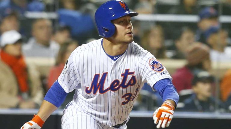 New York Mets left fielder Michael Conforto smacks a fifth-inning homer un during Game 4 of the World Series against the Kansas City Royals at Citi Field on Saturday, Oct. 31, 2015.