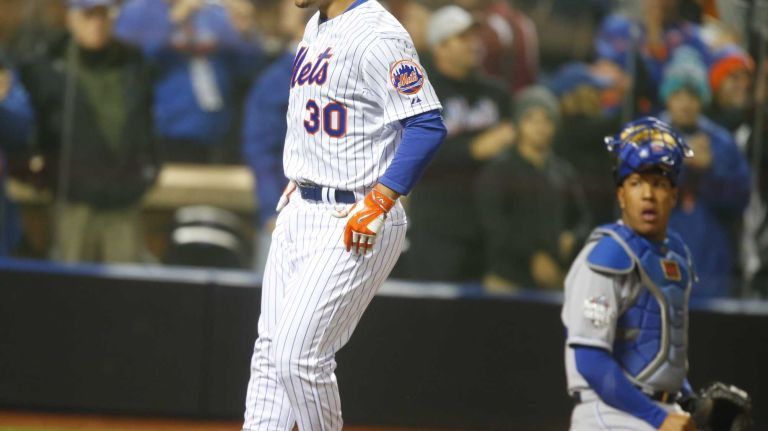 New York Mets left fielder Michael Conforto celebrates his third inning home run during Game 4 of the World Series against the Kansas City Royals at Citi Field on Saturday, Oct. 31, 2015.