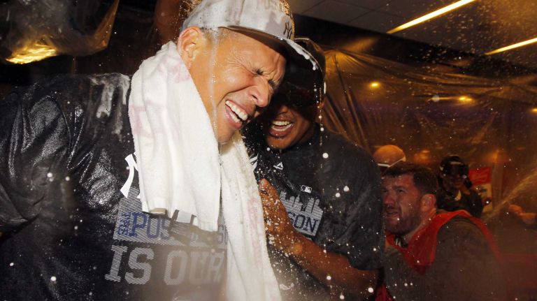 Alex Rodriguez, left, and Ivan Nova of the New York Yankees celebrate in the locker room after defeating the Boston Red Sox at Yankee Stadium on Thursday, Oct. 1, 2015.