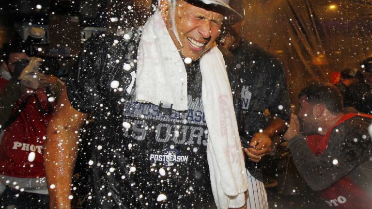 Alex Rodriguez of the New York Yankees celebrates in the locker room after defeating the Boston Red Sox at Yankee Stadium on Thursday, Oct. 1, 2015.