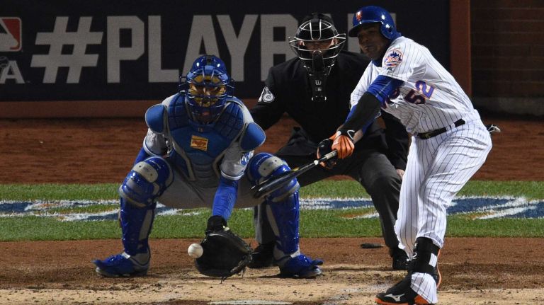 New York Mets centerfielder Yoenis Cespedes strikes out swinging during the second inning of Game 4 of the World Series against the Kansas City Royals at Citi Field on Saturday, Oct. 31, 2015.