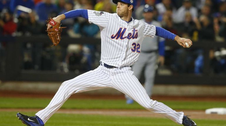 New York Mets starting pitcher Steven Matz (32) delivers the pitch in first inning during Game 4 of the World Series against the Kansas City Royals at Citi Field on Saturday, Oct. 31, 2015.