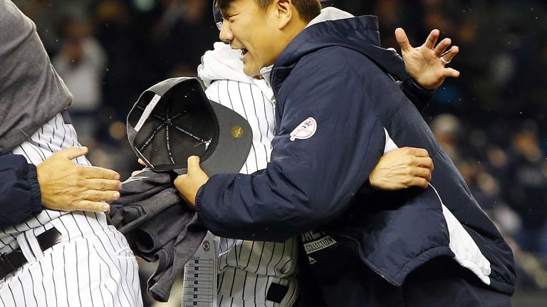 Masahiro Tanaka of the New York Yankees celebrates after defeating the Boston Red Sox at Yankee Stadium on Thursday, Oct. 1, 2015.