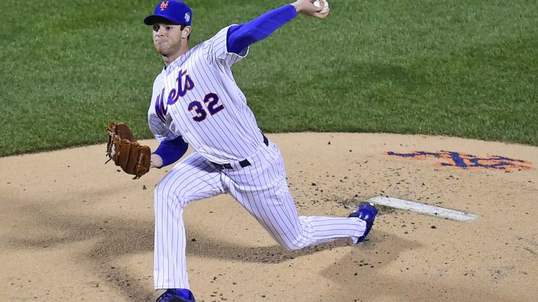 New York Mets starting pitcher Steven Matz (32) delivers the pitch in first inning during Game 4 of the World Series against the Kansas City Royals at Citi Field on Saturday, Oct. 31, 2015.