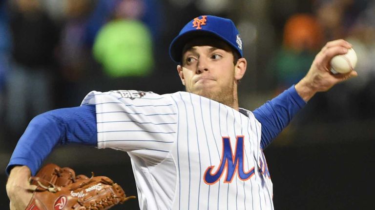 New York Mets starting pitcher Steven Matz delivers the pitch in the first inning during Game 4 of the World Series against the Kansas City Royals at Citi Field on Saturday, Oct. 31, 2015.