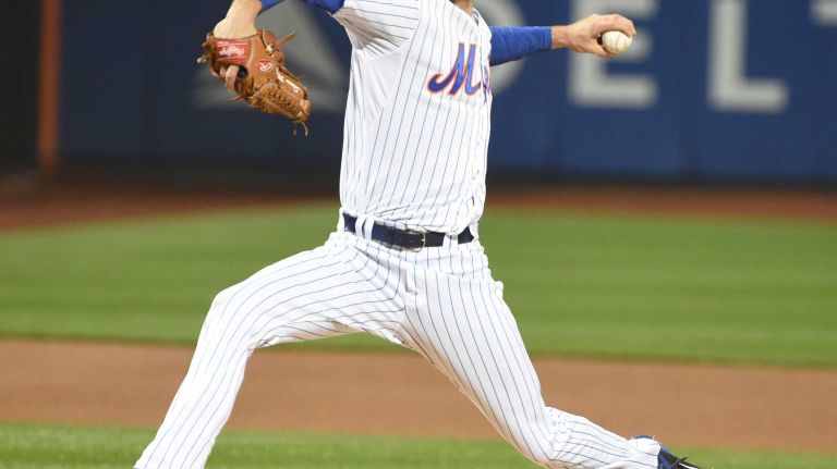 New York Mets starting pitcher Steven Matz delivers the pitch in the first inning during Game 4 of the World Series against the Kansas City Royals at Citi Field on Saturday, Oct. 31, 2015.