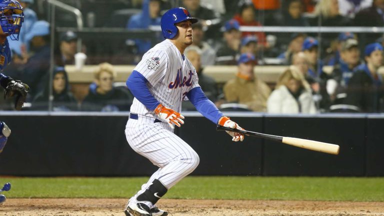New York Mets leftfielder Michael Conforto with the infield single in fourth inning during Game 3 of the World Series against the Kansas City Royals at Citi Field on Friday, Oct. 30, 2015.
