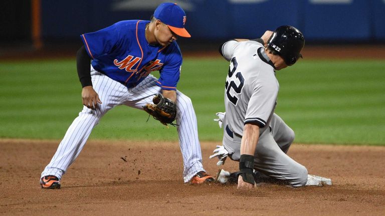 Subway Series: Yankees vs. Mets 55 New York Yankees center fielder Jacoby Ellsbury steals second base against New York Mets shortstop Ruben Tejada during the third inning of a baseball game at Citi Field on Sunday, Sept. 20, 2015.