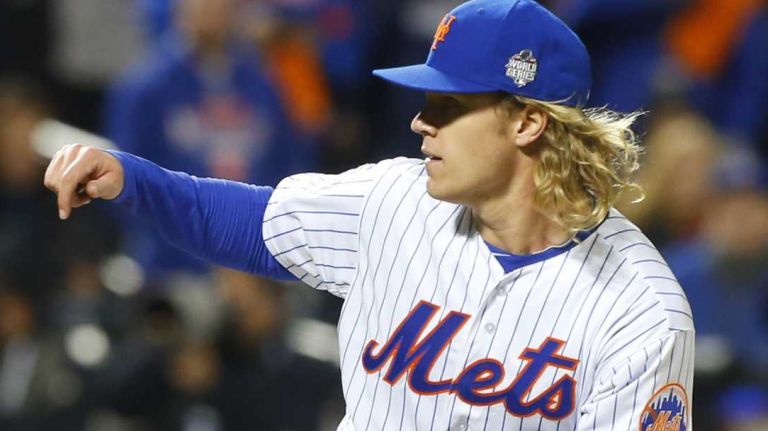 New York Mets starting pitcher Noah Syndergaard delivers the pitch in the fifth inning during Game 3 of the World Series against the Kansas City Royals at Citi Field on Friday, Oct. 30, 2015.