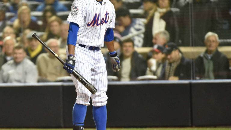 New York Mets right fielder Curtis Granderson reacts to the strike call in the fourth inning during Game 3 of the World Series against the Kansas City Royals at Citi Field on Friday, Oct. 30, 2015.