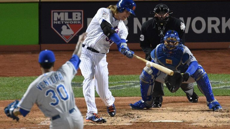 New York Mets starting pitcher Noah Syndergaard singles during Game 3 of the World Series against the Kansas City Royals at Citi Field on Friday, Oct. 30, 2015.