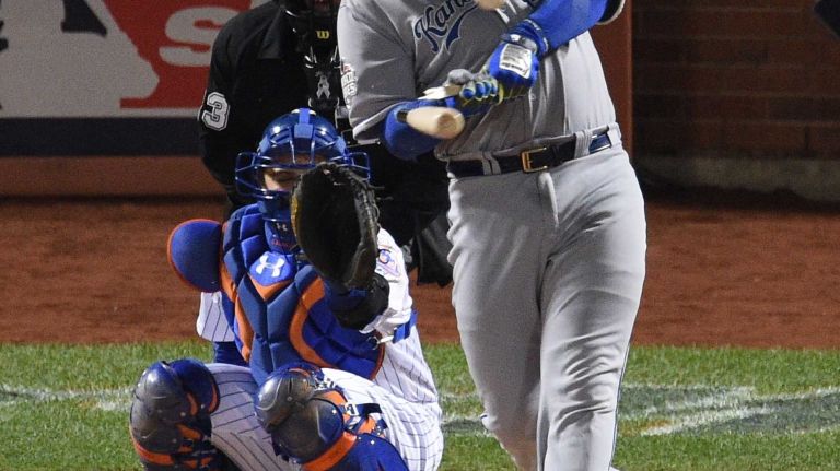 Kansas City Royals catcher Salvador Perez singles against the New York Mets during Game 3 of the World Series at Citi Field on Friday, Oct. 30, 2015.