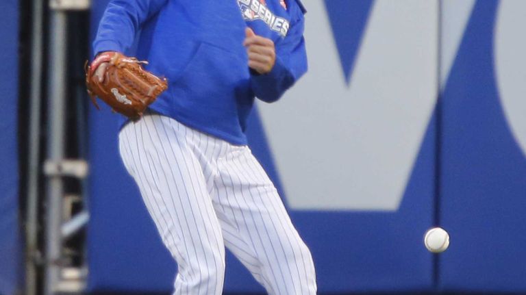New York Mets starting pitcher Steven Matz (32) in the outfield during batting practice of Game 3 of the World Series against the Kansas City Royals at Citi Field on Friday, Oct. 30, 2015.