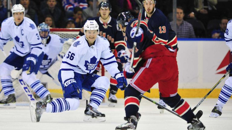 Toronto Maple Leafs center Byron Froese (56) attempts to block a shot from New York Rangers defenseman Ryan McDonagh (27) during the second period of a game at Madison Square Garden on Friday, Oct. 30, 2015.