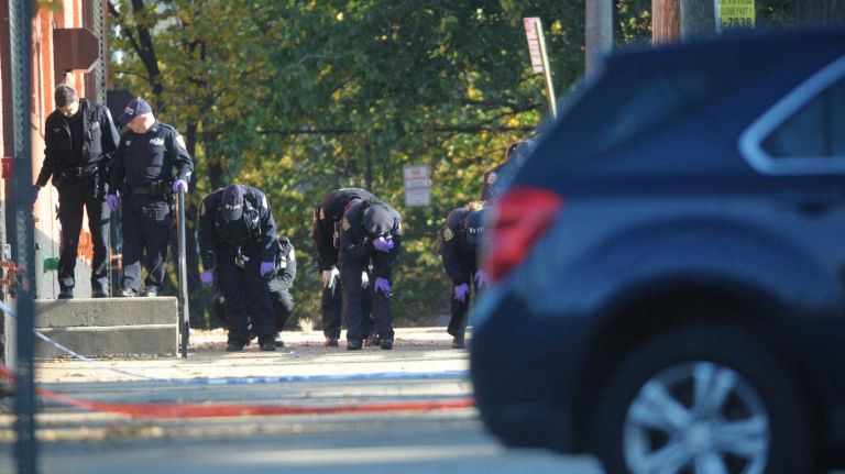 NYPD sergeants shot, 1 fatally, in Bronx's Van Nest neighborhood 1 NYPD investigators look for evidence on Saturday, Nov. 5, 2016, at the spot where a shootout took place Friday between NYPD officers and a suspect in the Van Nest neighborhood of the Bronx.