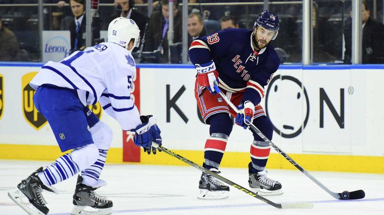 New York Rangers defenseman Keith Yandle (93) is defended by Toronto Maple Leafs defenseman Jake Gardiner (51) during the first period of a game at Madison Square Garden on Friday, Oct 30, 2015.