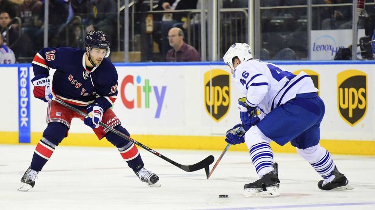 New York Rangers center Derick Brassard (16) is defended by Toronto Maple Leafs defenseman Roman Polak (46) during the first period of a game at Madison Square Garden on Friday, Oct 30, 2015.