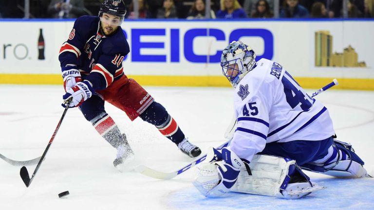New York Rangers center Derick Brassard (16) takes a shot on Toronto Maple Leafs goalie Jonathan Bernier (45) during the first period of a game at Madison Square Garden on Friday, Oct 30, 2015.