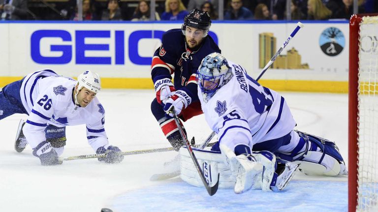 New York Rangers center Derick Brassard (16) takes a shot on Toronto Maple Leafs goalie Jonathan Bernier (45) during the first period of a game at Madison Square Garden on Friday, Oct 30, 2015.