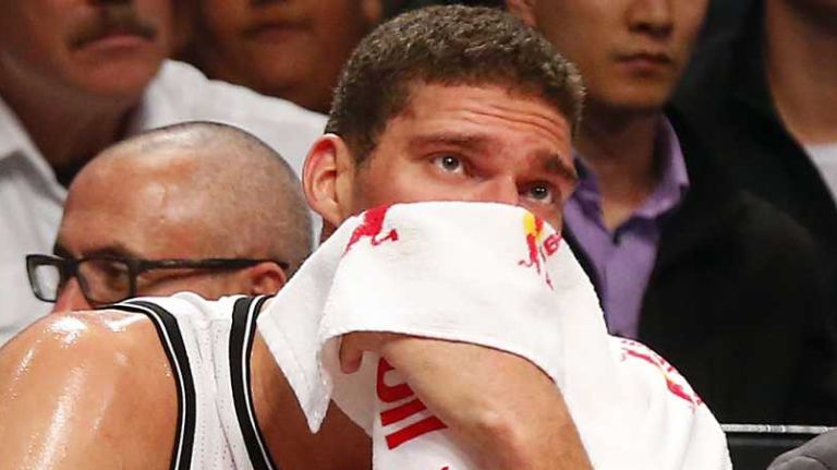Nets vs. Bulls 24 Brook Lopez of the Brooklyn Nets looks on from the bench in the fourth quarter against the Chicago Bulls at Barclays Center on Wednesday, Oct. 28, 2015 in Brooklyn, New York.