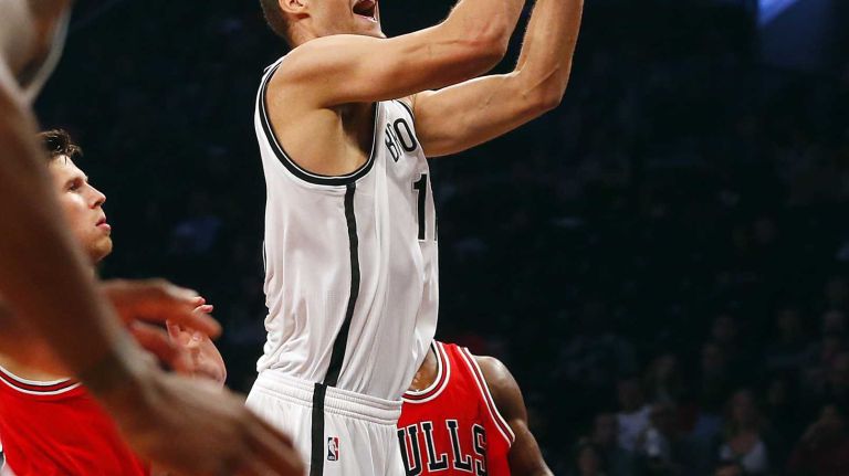 Nets vs. Bulls 27 Brook Lopez #11 of the Brooklyn Nets goes to the hoop for a basket in the first half against the Chicago Bulls at Barclays Center on Wednesday, Oct. 28, 2015 in Brooklyn, New York.