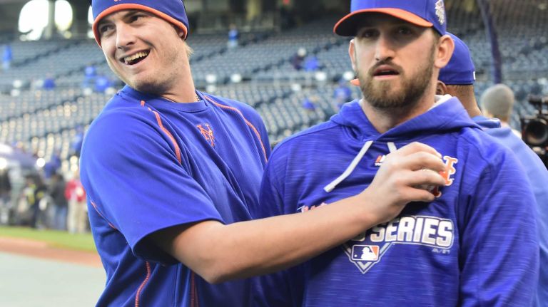 World Series Game 2: Mets vs. Royals 85 New York Mets relief pitcher Addison Reed (43) and New York Mets starting pitcher Jonathon Niese (49) during warmups before Game 2 of the World Series against the Kansas City Royals at Kauffman Stadium on Wednesday, Oct. 28, 2015.