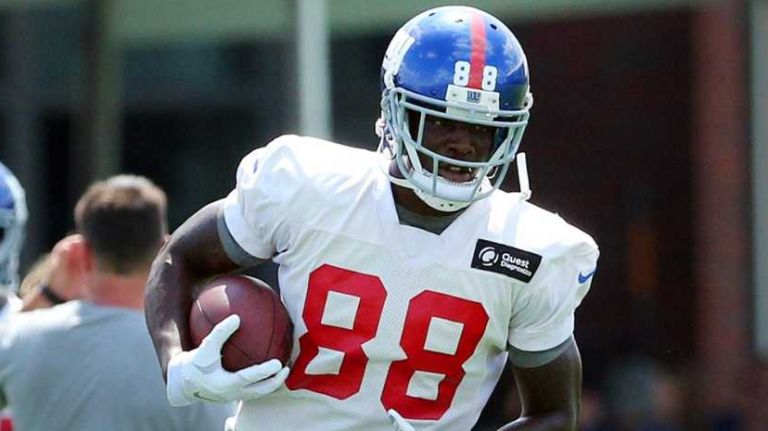 New York Giants wide receiver Corey Washington runs with the ball during training camp at the Quest Diagnostics Training Center in East Rutherford, N.J., on Saturday, Aug. 1, 2015.