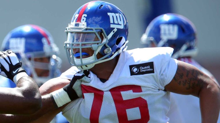 Giants offensive tackle Ereck Flowers blocks defensive end George Selvie during training camp at the Quest Diagnostics Training Center in East Rutherford, New Jersey, on Friday, July 31, 2015.