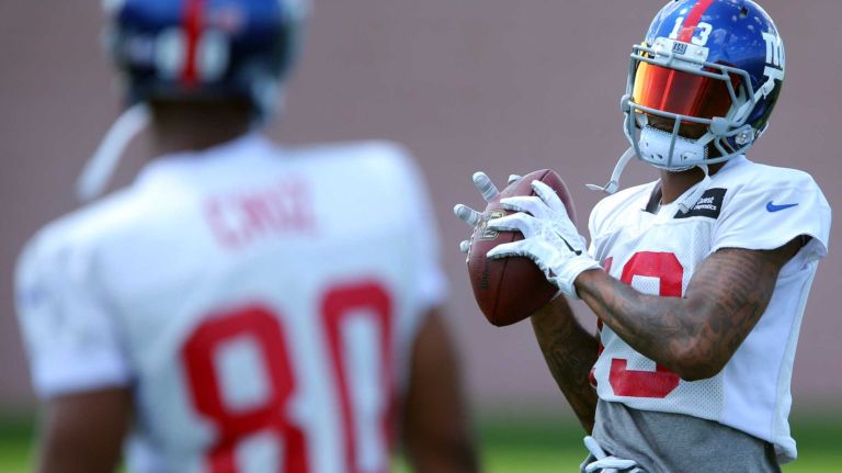 Giants wide receivers Victor Cruz and Odell Beckham Jr. play catch during training camp at the Quest Diagnostics Training Center in East Rutherford, New Jersey, on Friday, July 31, 2015.