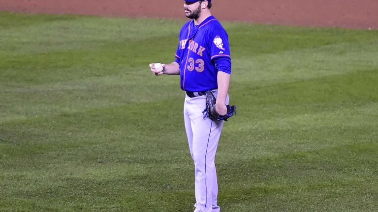 World Series Game 1: Mets vs. Royals 121 New York Mets starting pitcher Matt Harvey (33) reacts after the inside the park homer by Kansas City Royals shortstop Alcides Escobar (2) in first inning during Game 1 of the World Series against the Kansas City Royals at Kauffman Stadium on Tuesday, Oct. 27, 2015.
