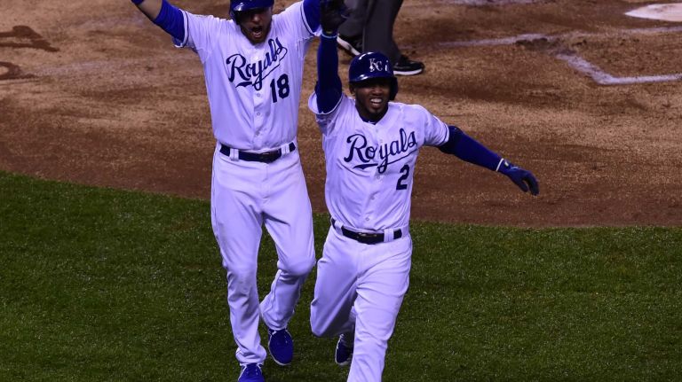 World Series Game 1: Mets vs. Royals 127 Kansas City Royals second baseman Ben Zobrist (18) high fives Kansas City Royals shortstop Alcides Escobar (2) after the inside the park homer during Game 1 of the World Series against the Kansas City Royals at Kauffman Stadium on Tuesday, Oct. 27, 2015.