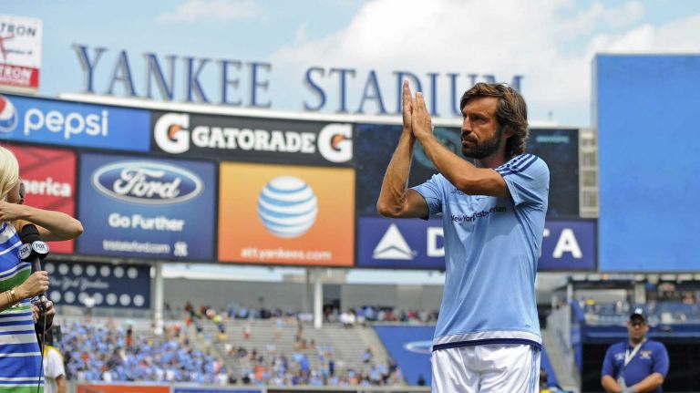 New York City FC midfielder Andrea Pirlo (21) waves to the fans before an MLS game against the Orlando City FC at Yankee Stadium on Sunday, July 26, 2015.