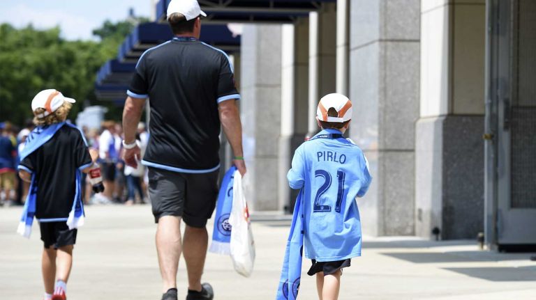 A young fan wears an Andrea Pirlo jersey before an MLS game between the New York City FC and the Orlando City FC at Yankee Stadium on Sunday, July 26, 2015.