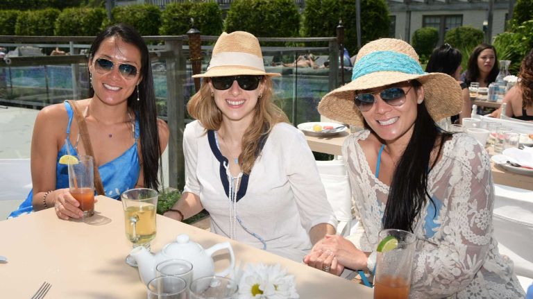 Moon Kim, Ivy Zuckerman, and Rae Kim enjoying cocktails by the pool at the Jazz and Bossa Nova Brunch with Marcello and Ludmilla at Sole East on July 5, 2015 in Montauk. photo by Rob Rich/SocietyAllure.com