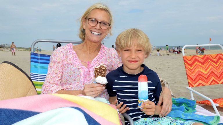 Helenmarie and Nicholas Rodgers eat ice cream at Sagg Main beach in Sagaponack, Saturday July 4th, 2015.