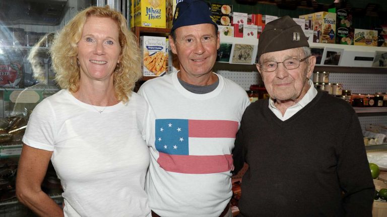 Laura DeCarlo, Alan DeCarlo and World War II veteran Salvatore DeCarlo attended the Fourth of July parade on July 4, 2015, in Southampton.