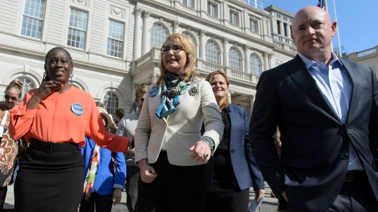 Chirlane McCray, former Congresswoman Gabrielle Giffords  and her husband Capt. Mark Kelly, a retired astronaut, as well as City Council Speaker Melissa Mark-Viverito, called for curbs on gun violence during a news conference at City Hall in Manhattan on  Oct.  17, 2016.
