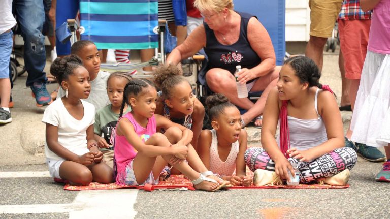Children enjoy the Fourth of July parade on July 4, 2015, in Southampton.