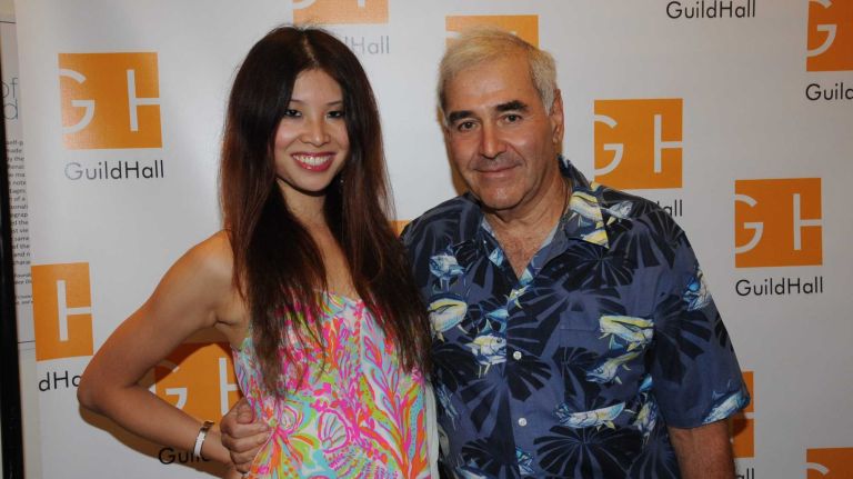 Kathy Quan and Andy Sabin attend The Beach Boys concert at Guild Hall in East Hampton on July 3, 2015.