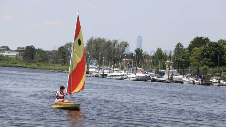 Bergen Beach 43 A sailboat in the Paerdegast basin with the Freedom Tower in the background in Bergen Beach, Brooklyn, July 3, 2015.