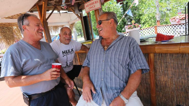 Bergen Beach 45 Frank Amore, left, Louis Forte, center, and Charles Marchica, sit at the bar at the Hudson River Yacht Club at 2101 Bergen Ave. in Bergen Beach, Brooklyn, July 3, 2015.