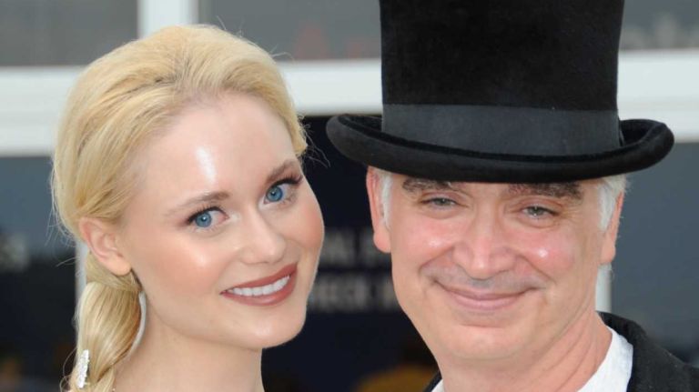 Kristin Mackie and artist Kevin Berlin arrive at the opening Thursday, July 2, 2015, of ArtHamptons in Bridgehampton.