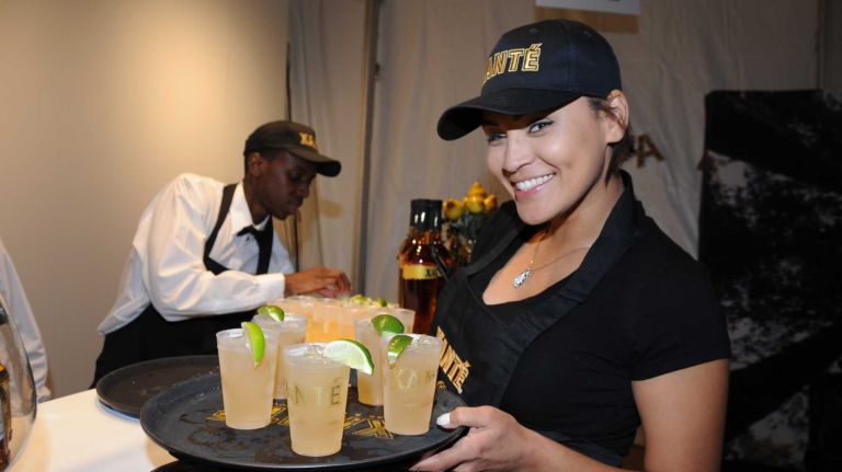 Waitress Andrea Lee at the opening Thursday, July 2, 2015, of ArtHamptons in Bridgehampton.