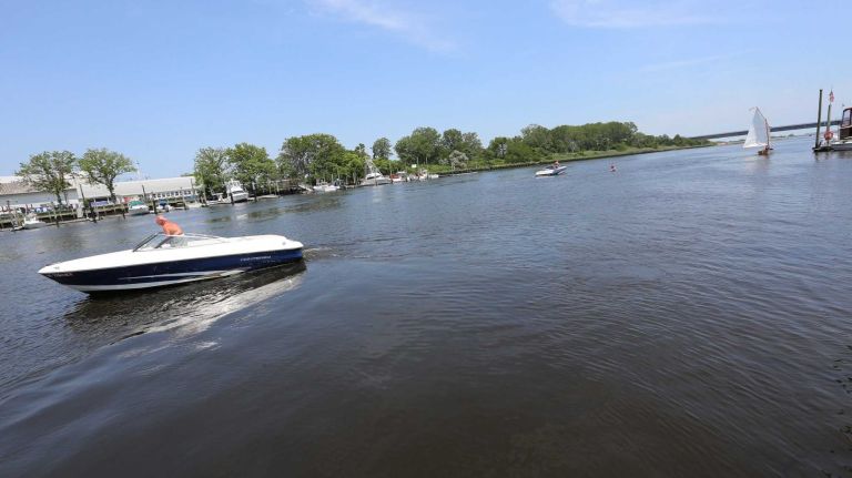 Bergen Beach 51 Tommy Panchianco, member of the Hudson River Yacht Club, in his boat in the Paerdegast Basin in Bergen Beach, Brooklyn, July 3, 2015.