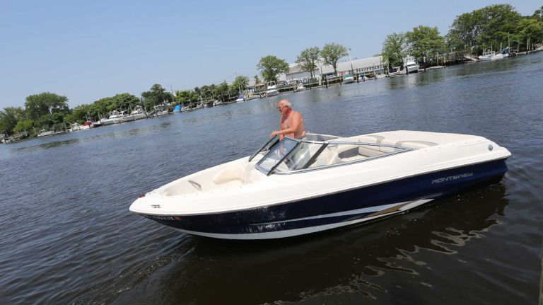Bergen Beach 55 Tommy Panchianco, member of the Hudson River Yacht Club, in his boat in the Paerdegast Basin in Bergen Beach, Brooklyn, July 3, 2015.